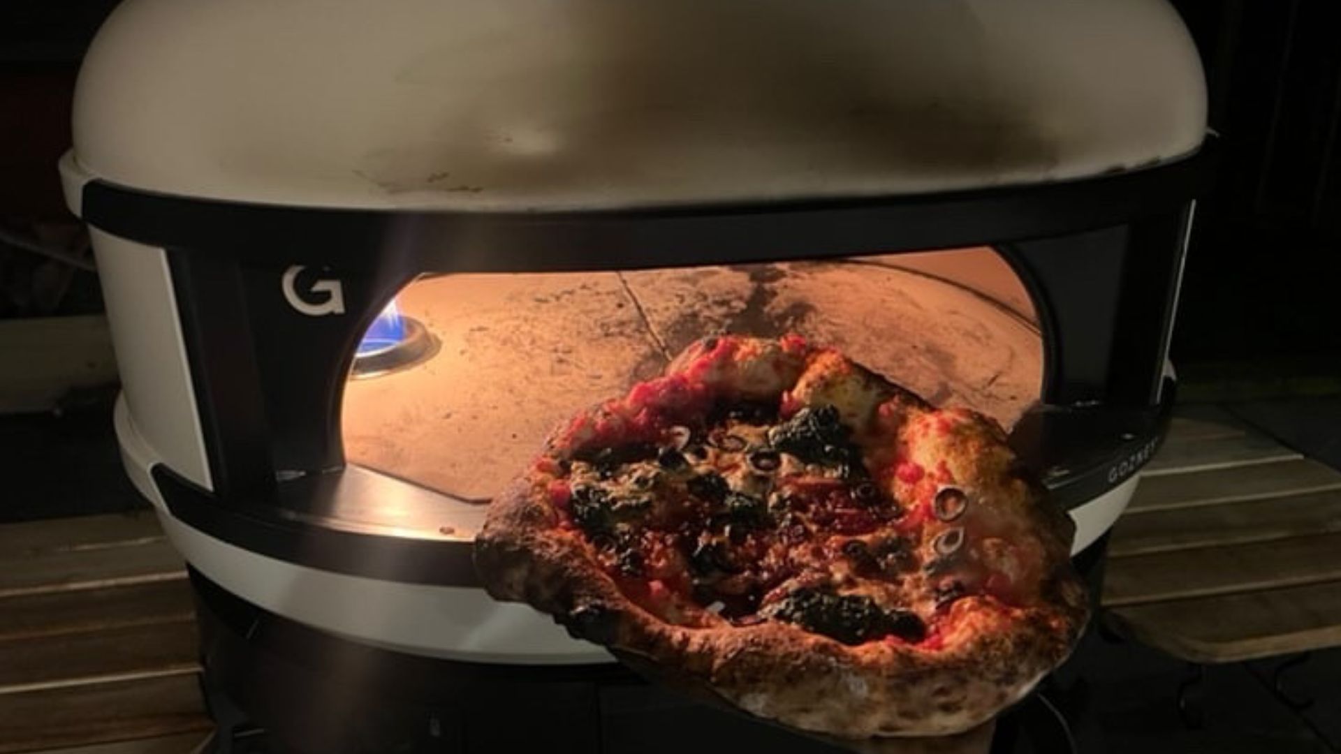 Taking pizza out the Gozney Dome S1