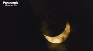 The moon encroaches more and more onto the face of the sun, moving toward a total solar eclipse over Australia on Nov. 13, 2012.