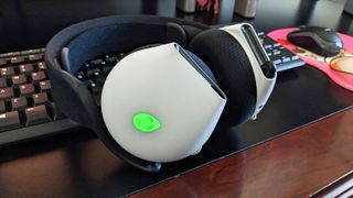 Alienware 720H Wireless Gaming Headset glowing RGB lights.