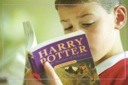 Child reading Harry Potter and the Prisoner of Azkaban