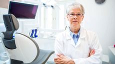 Portrait of a female mature dentist in her clinic