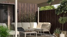 a render of a outdoor seating area under a pergola with timber cladding and fence
