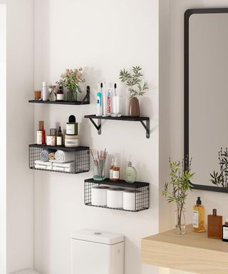 a white bathroom with floating shelves and products