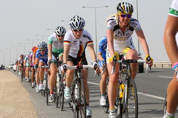 The bunch was stretched out by an acceleration and a strong headwind.