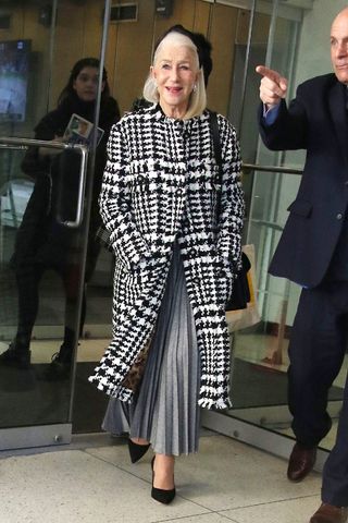 Helen Mirren wearing a checked tweed coat