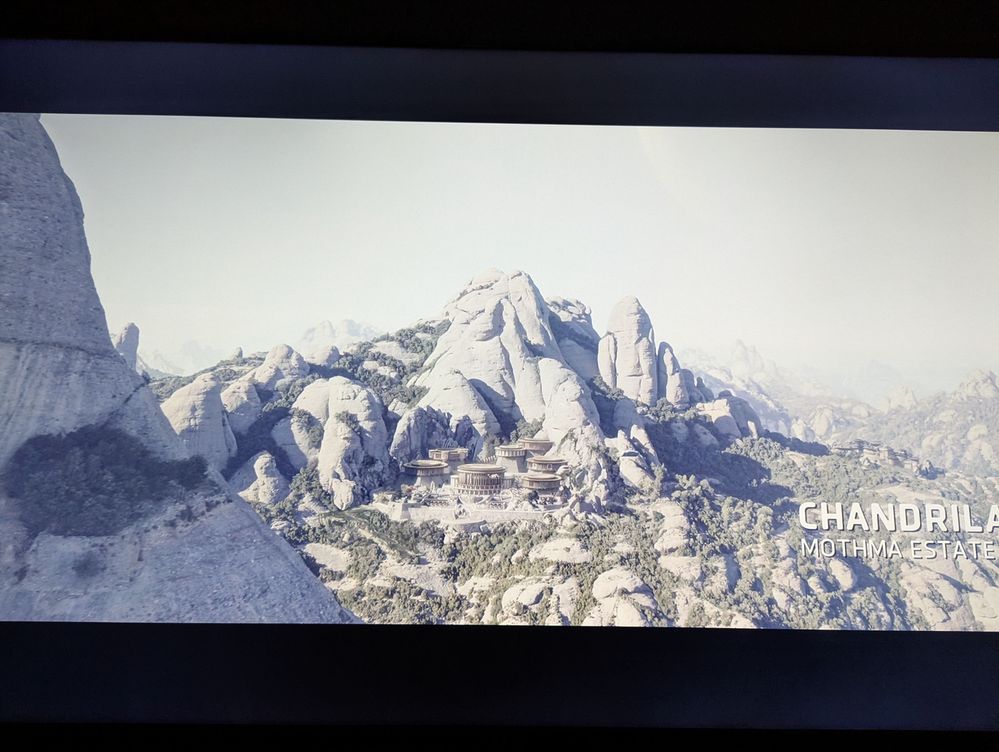 A photograph of a Roku TV streaming Andor from Disney Plus. The colors appear to be greyish and washed out