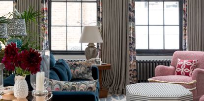 Blue and pink living room with long drapes