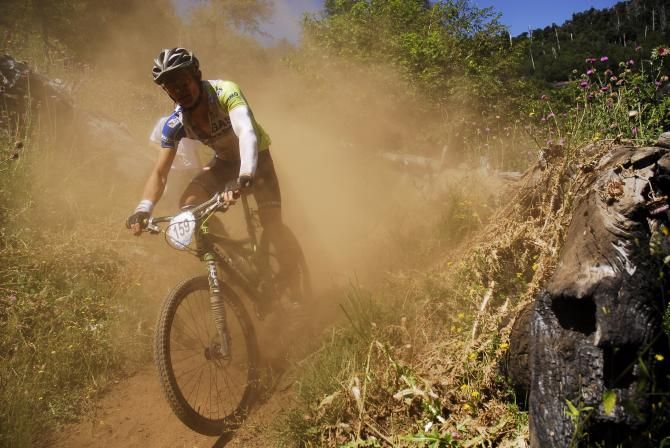 A racer stirs up some dust during stage 4 of the Trans Andes