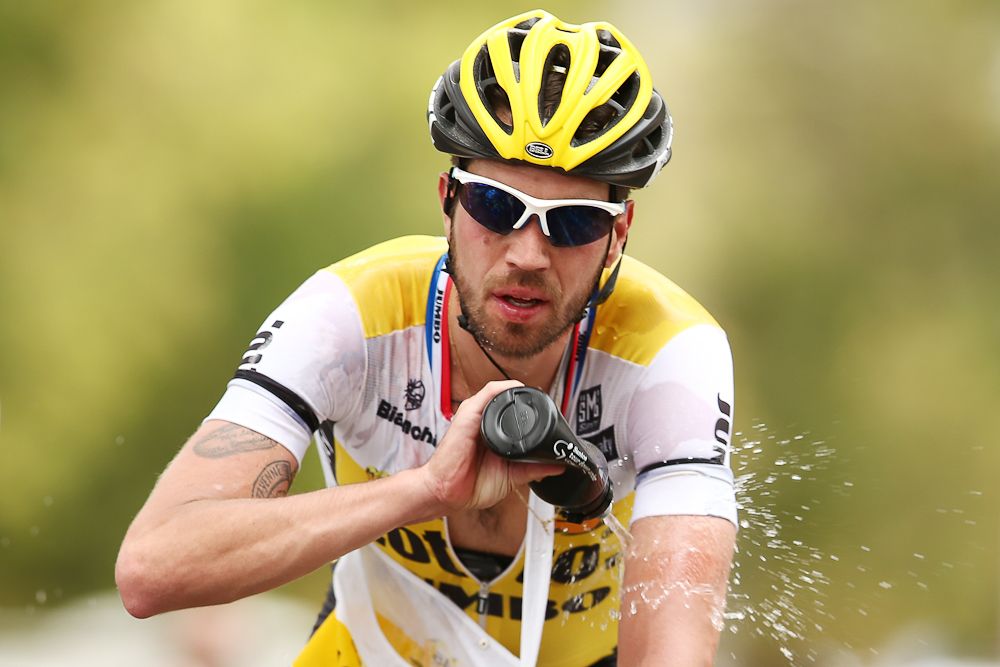 Martijn Keizer of the Lotto NL - Jumbo team sprays water over his body to cool down in the hot conditions during stage 1 of the 2016 Tour Down Under