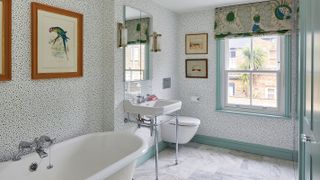 bathroom with pretty floral wallpaper