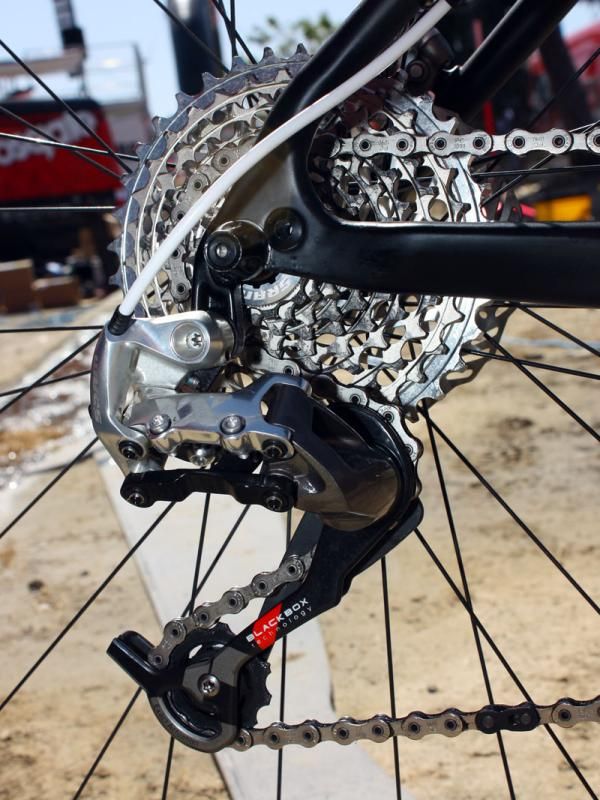 A SRAM XX rear derailleur moves the chain across an 11-36T XX cassette.