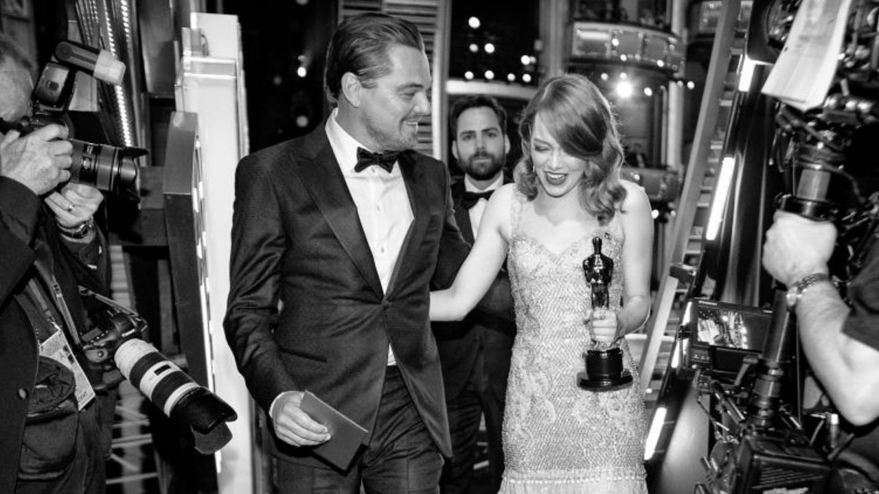 Emma Stone and Leonardo DiCaprio at the Oscars - luckiest oscar dress colour