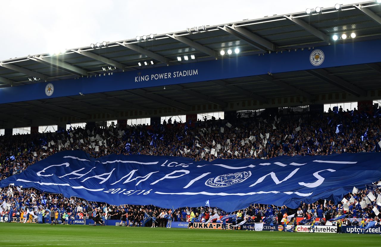 LEICESTER, ENGLAND - MAY 07:Leicester City supporters hold a big Champions banner prior to the Barclays Premier League match between Leicester City and Everton at The King Power Stadium on Ma