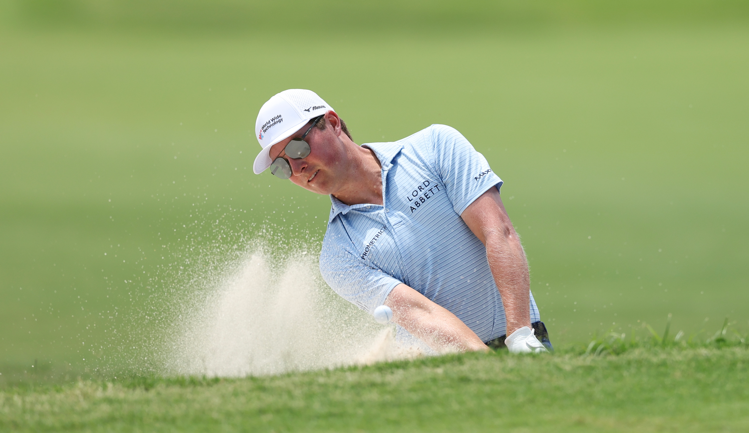 Ben Griffin hits a bunker shot