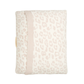 A pink pet bed with a leopard print pattern