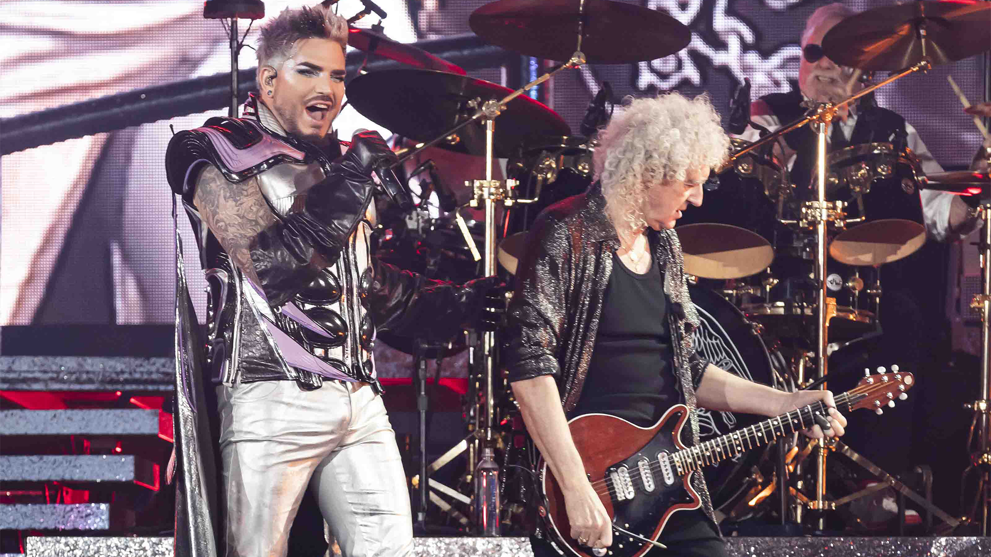 Adam Lambert performs with Brian May and Roger Taylor of Queen at BMO Stadium on November 11, 2023 in Los Angeles, California.