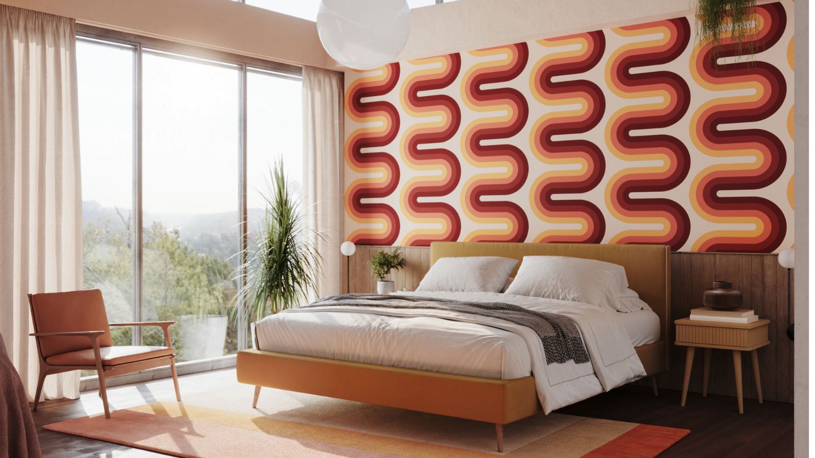 Squiggle retro wallpaper on a wide wall behind a mid-century style low-profile bed. The bedroom is bright with floor to ceiling windows and dark hardwood floors with orange gradient rug