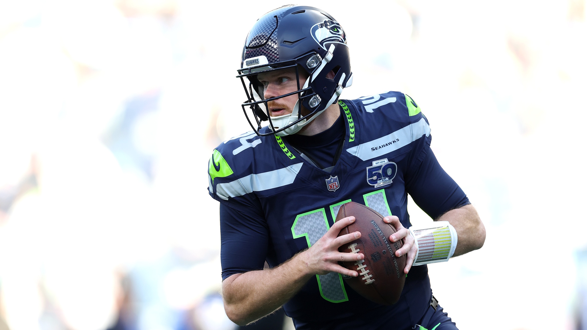 Sam Darnold of the Seattle Seahawks warms up prior to an NFL playoffs game.