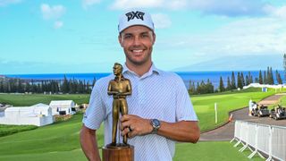 Eric Cole with the 2023 PGA Tour Rookie of the Year award