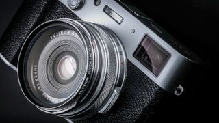 Close-up of lens of the Fujifilm X100VI camera