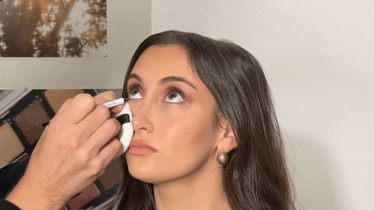A gif of Alyssa Brascia getting her makeup done by Mario Dedivanovic.