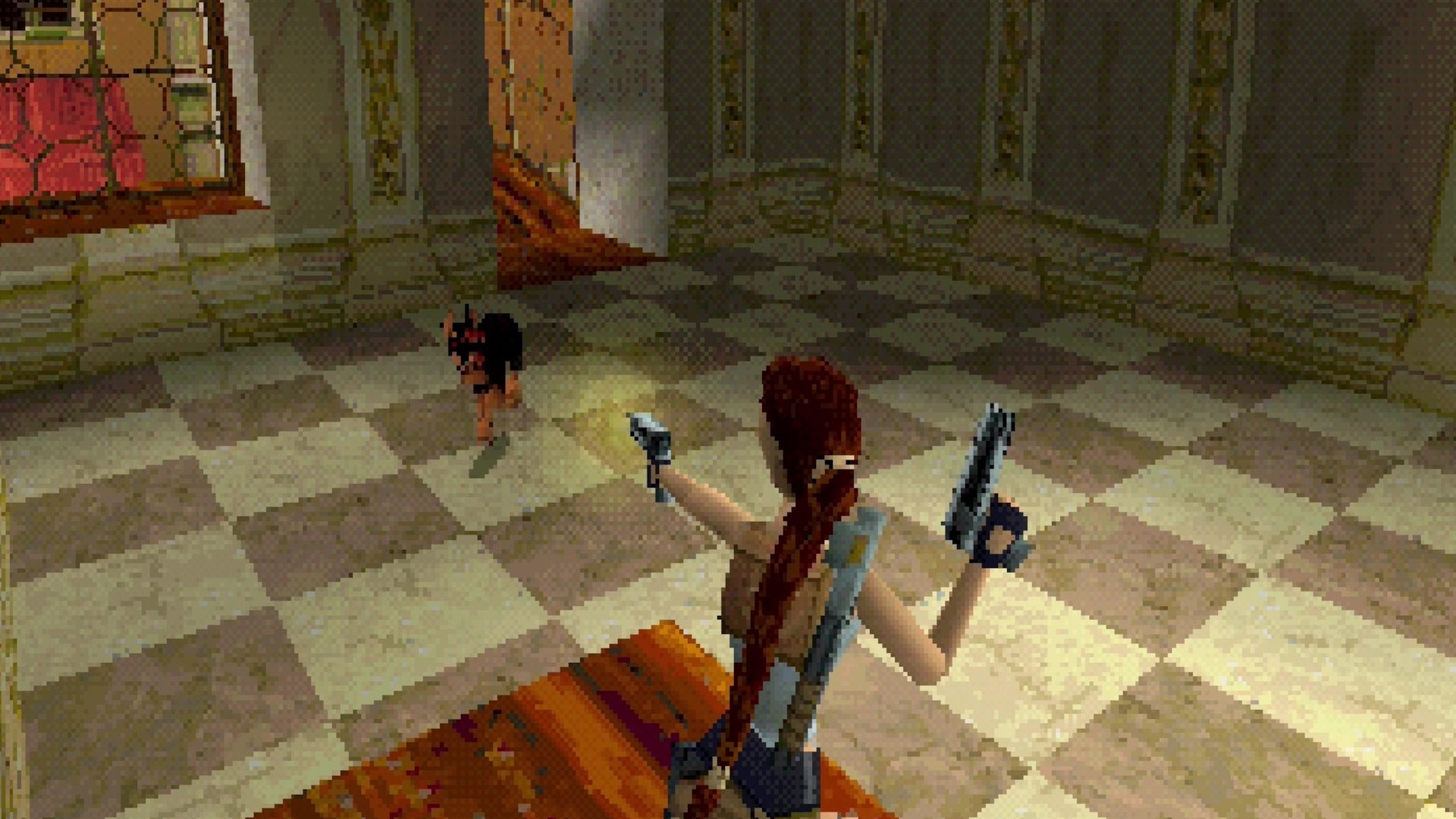 Lara Croft pointing a gun at a dog in a museum during the game Tomb Raider 2 while holding another gun in her hand.
