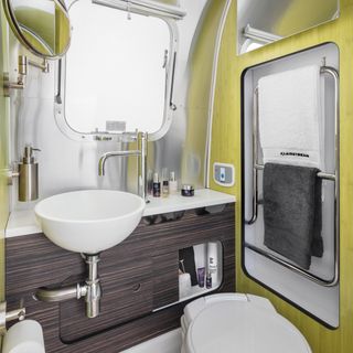airstream model with bathroom and wash basin with towels