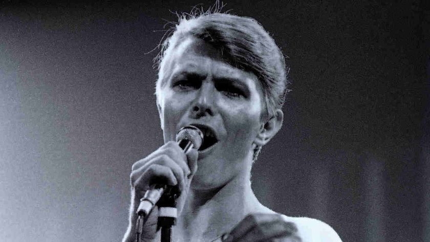David Bowie performing onstage in 1977