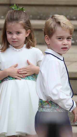Princess Charlotte of Cambridge and Prince George of Cambridge ahead of the wedding of Princess Eugenie of York and Mr. Jack Brooksbank at St. George's Chapel on October 12, 2018 in Windsor, England