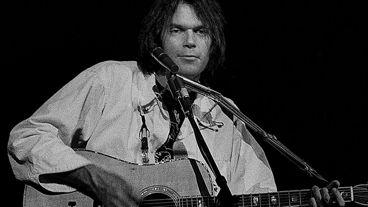 Neil Young performs in Atlanta on November 24, 1976