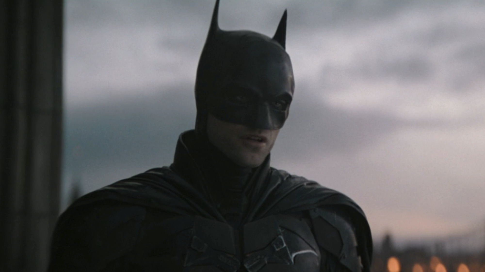 Batman (Robert Pattinson) talks to Selina Kyle in The Batman.