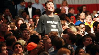 Igor Vovkovinskiy, 27, waits for President Barack Obama to speak on health care during a rally at the Target Center on Sept. 12, 2009 in Minneapolis, Minnesota.