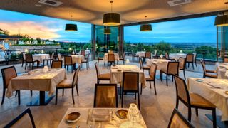The main restaurant Aurevo overlooks the pool and valley