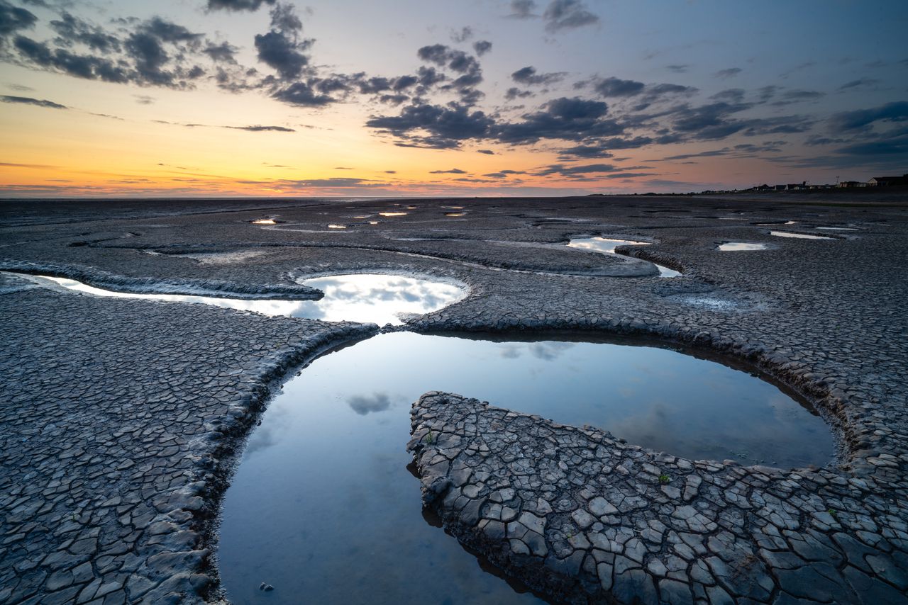 Photo of mudflats and water taken with the Viltrox AF 16mm f/1.8 FE lens