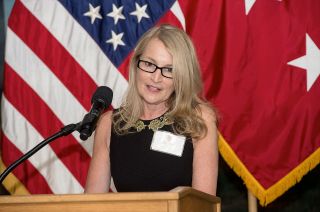 Bonnie Baer, daughter of NASA astronaut Ed White, received her father's posthumous award on behalf of the White family at the Ambassador of Exploration award ceremony June 3, 2015 at West Point.