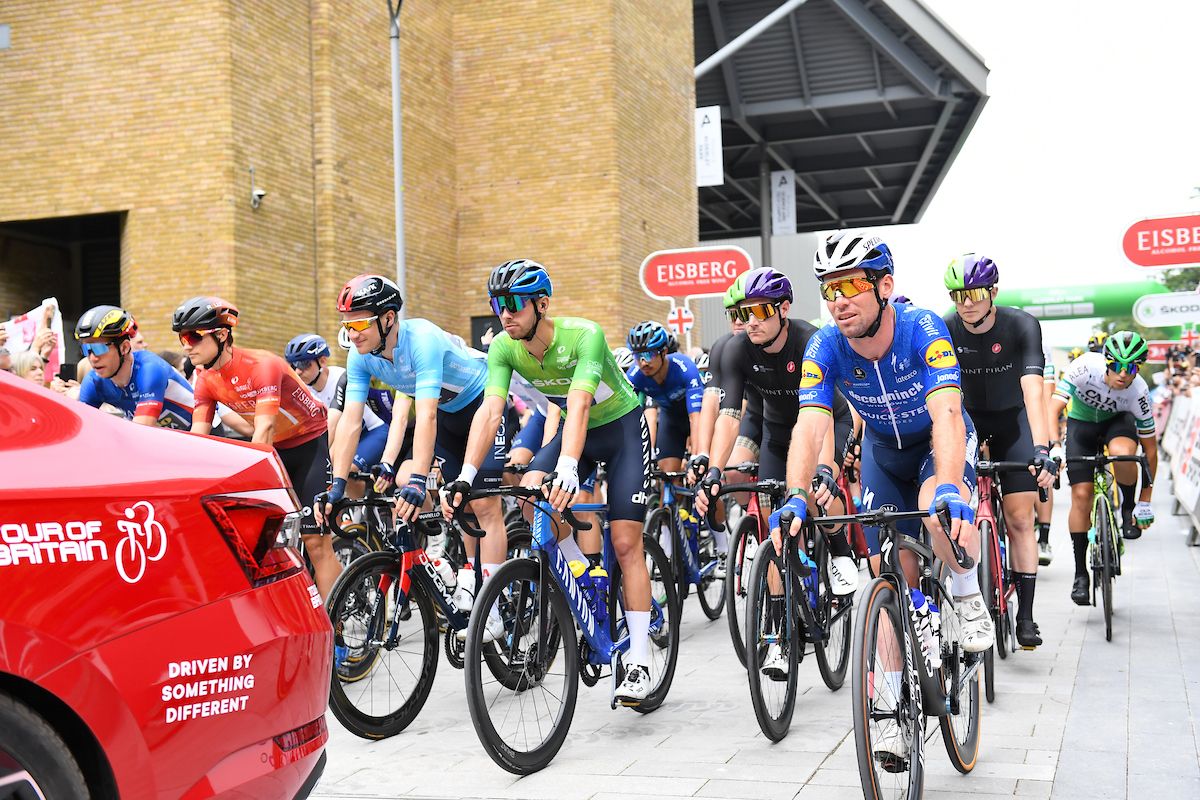 Picture by SWpix.com - 09/09/2021 - Cycling - AJ Bell Tour of Britain Stage 5 - Alderley Park to Warrington, England - Riders roll out for the start of stage five featuring Mark Cavendish of Deceuninck QuickStep, Jacob Scott of Canyon dhb SunGod (Wearing the &Aring;&nbsp;KODA King of the Mountains Jersey), Ethan Hayter of INEOS Grenadiers (Wearing the Sportsbreaks.com Points Jersey), Robin Carpenter of Rally Cycling (Wearing the Eisberg Sprints Jersey) and Wout van Aert of Team Jumbo Visma (Wearing the Overall Race Leader&acirc;s Jersey)