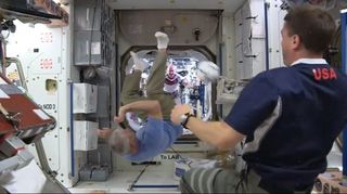 Astronauts Kick a Ball Aboard the International Station