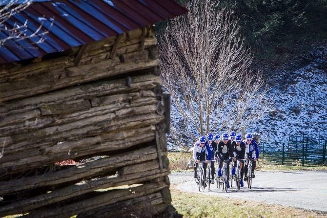 The team passes by an old barn along todays ride