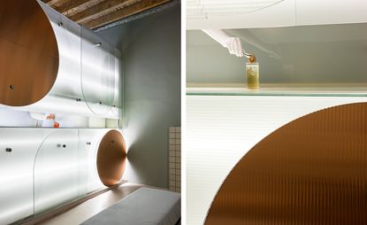 Two side-by-side interior photos of Studiopepe’s Club Unseen. The first photo shows the illuminated bar with brown and clear curved design elements. And the second photo is a close up of the bar that has a glass of drink on top. There is a hand adding a piece of fruit to the drink