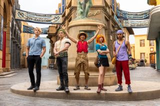 Sanji, Zoro, Luffy, Nami and Usopp actors from Netflix's One Piece posed on the Loguetown set