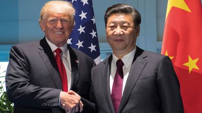 Donald Trump and Xi Jinping © SAUL LOEB/AFP via Getty Images