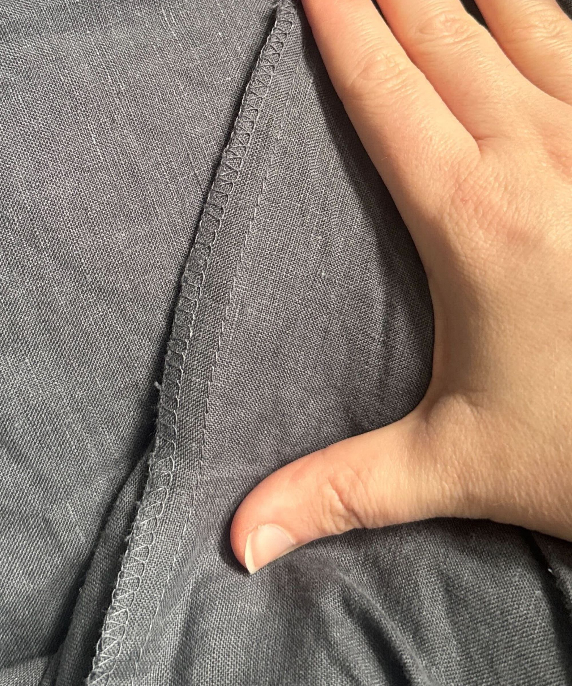 close up details of Pottery Barn's linen bedding