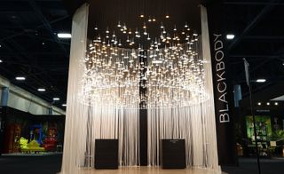 Blackbody designed a striking illuminated booth of hanging lights