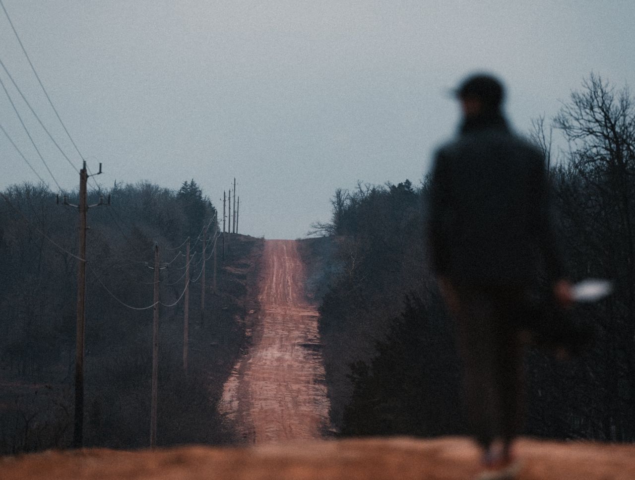 A charred landscape next to dirt roads in Oklahoma where thousands of riders would have passed on gravel rides