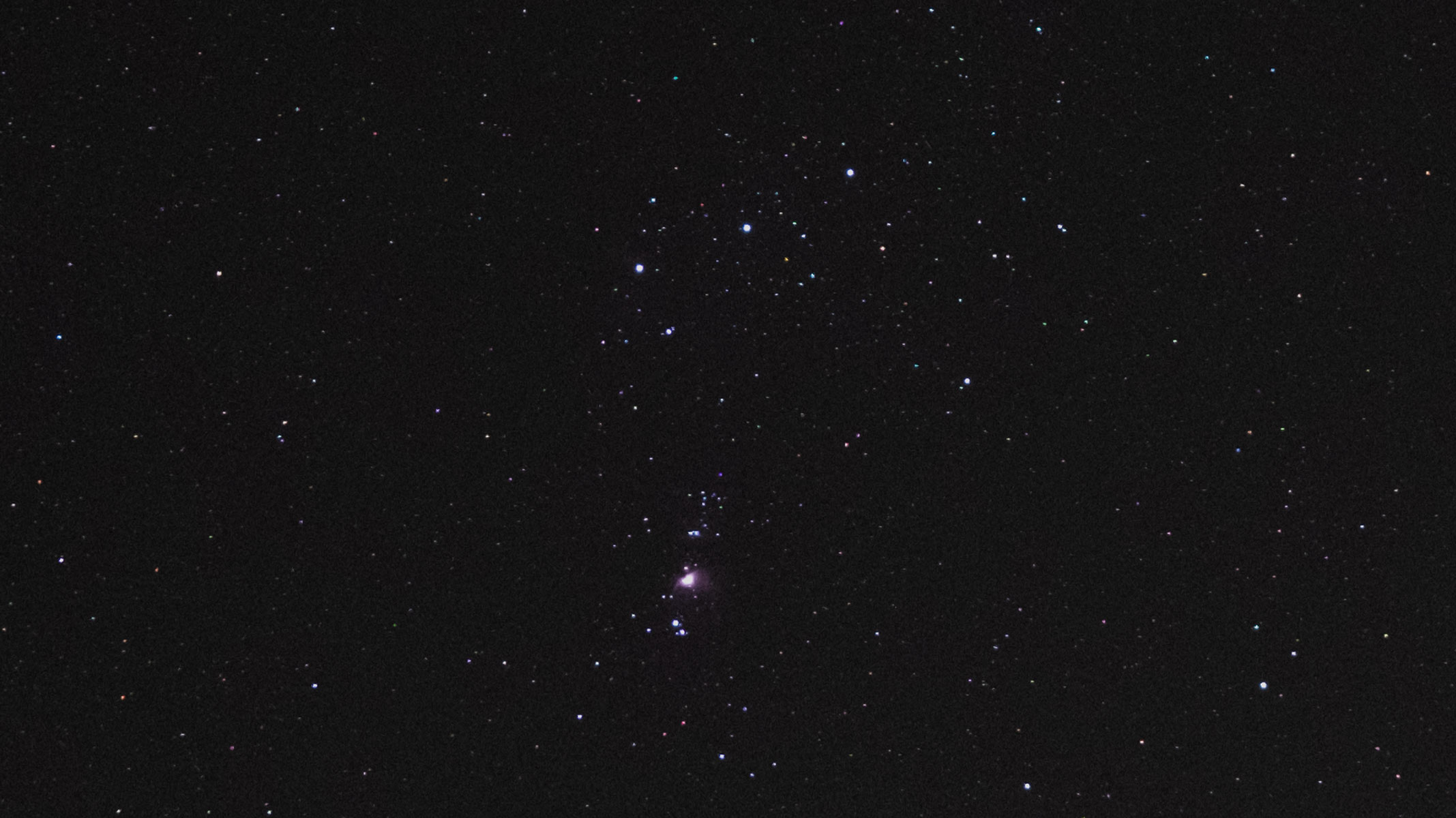 The Orion Nebula and Orion's Belt in the night sky