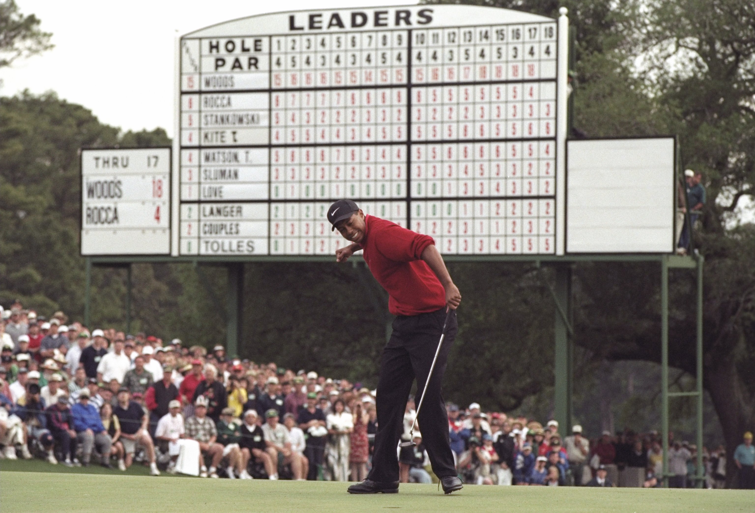 13 Apr 1997: Tigers Woods hits a four foot putt on the 18th hole to win the Masters Tournament at the Augusta National Golf Course in Augusta, Georgia. Mandatory Credit: Steve Munday /Allsport