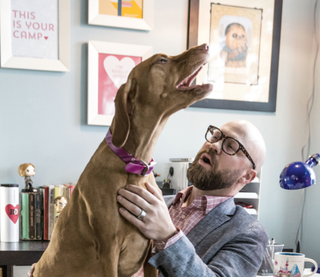 Sloane is quick to let her human Steve Fisher know when he's been working too long