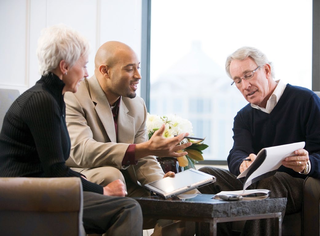 People discussing annuities with an adviser