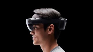 A man wearing Microsoft HoloLens