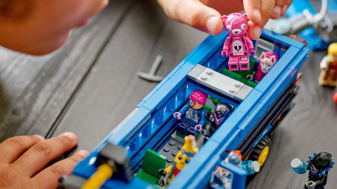 Lego Battle Bus being played with in a home setting, with the set and minifigures on a table